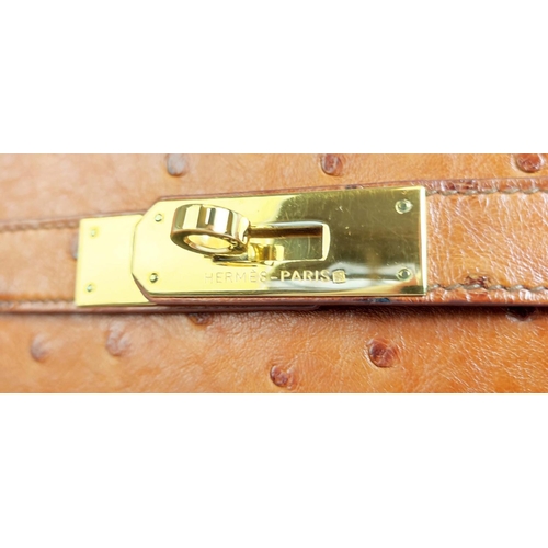 14 - HERMÈS KELLY SELLIER 32 OSTRICH, gold tone hardware, top handle, color matching leather lining, one ... 