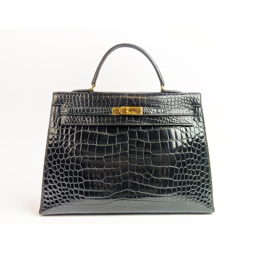 25 - HERMÈS KELLY SELLIER 35 CROCODILE NILOTICUS LISSE, gold tone hardware, top handle, color matching le... 