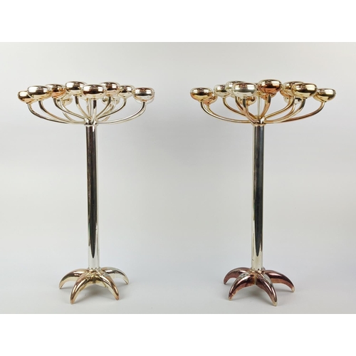 3 - CANDELABRAS, a pair, German silver plated tea light holders by Hrw Fink, 58cm H x 40cm. (2)