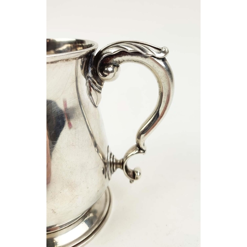 31 - SILVER MUG, George III, London 1765, makers Mark WJ, acanthus cast handle, footed base, 12cm high, 8... 