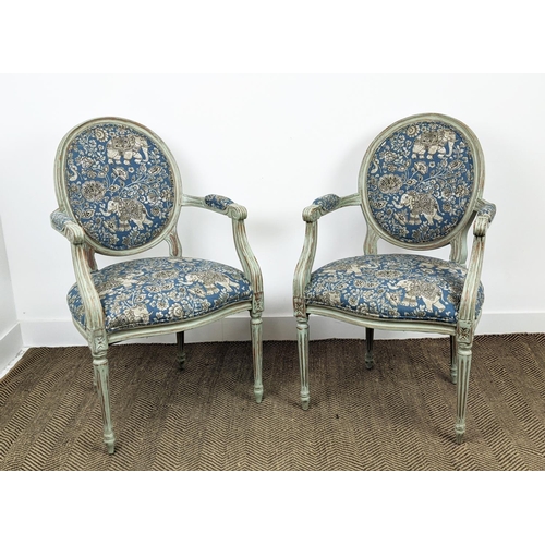 581 - FAUTEUILS, a pair, Louis XVI style grey painted, in blue elephant patterned upholstery, 97cm H x 60c... 