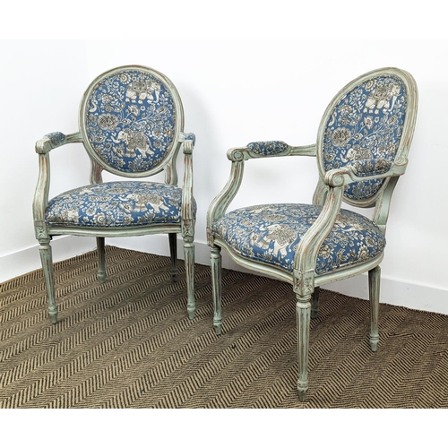 581 - FAUTEUILS, a pair, Louis XVI style grey painted, in blue elephant patterned upholstery, 97cm H x 60c... 