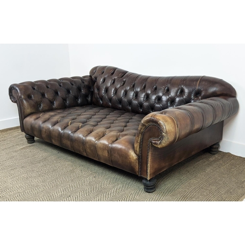 583 - SOFA, deep seated in buttoned brown leather, 74cm H x 205cm W x 107cm D.