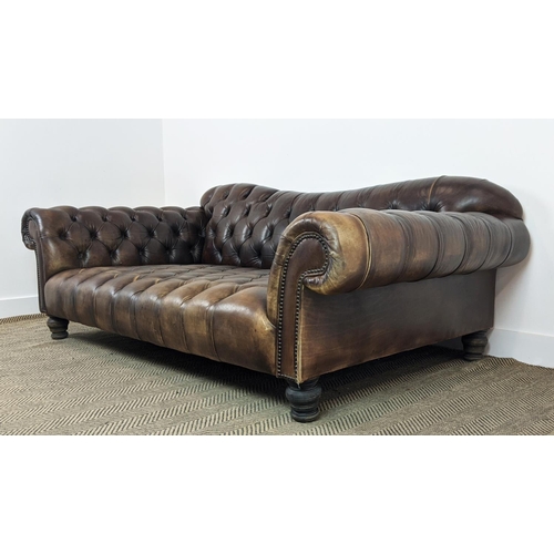 583 - SOFA, deep seated in buttoned brown leather, 74cm H x 205cm W x 107cm D.