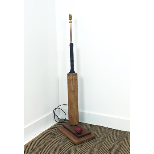 592 - CRICKET BAT AND BALL FLOOR LAMP, 122cm H x 35cm W x 20cm D.