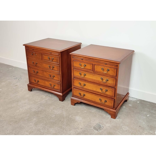 143 - BEDSIDE CHESTS, a pair, Georgian style yewwood, each with green leather slide above five drawers, 67... 