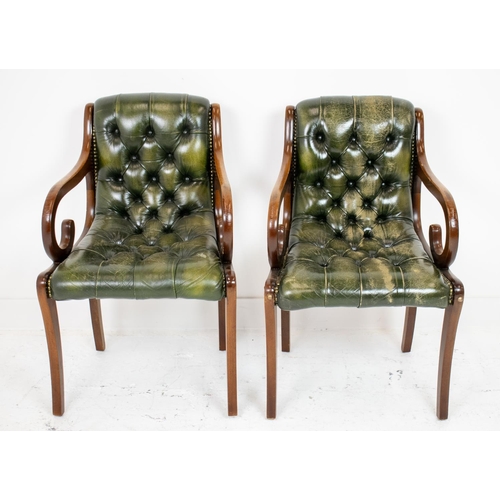 142 - ARMCHAIRS, a pair, Regency style mahogany and buttoned green leather, 86cm H x 52cm. (2)