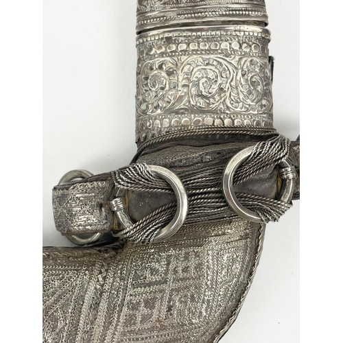 4 - OMANI KHANJAR DAGGERS, two 19th century silver thread and a Syrian Jambiya, Jambiya 35cm H. (3)