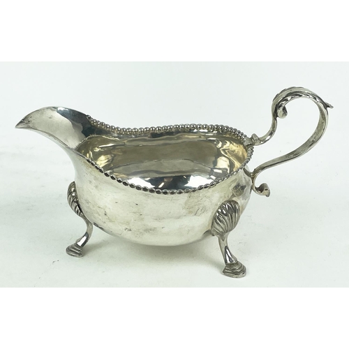 50 - A GEORGE III SILVER SAUCE BOAT, Newcastle 1784, made by John Mitchison, with acanthus scrolled handl... 