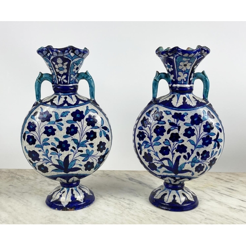 1 - SIND POTTERY MOONFLASK VASES,  a pair, 19th century decorated in blue and turquoise enamels with scr... 