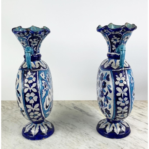 1 - SIND POTTERY MOONFLASK VASES,  a pair, 19th century decorated in blue and turquoise enamels with scr... 