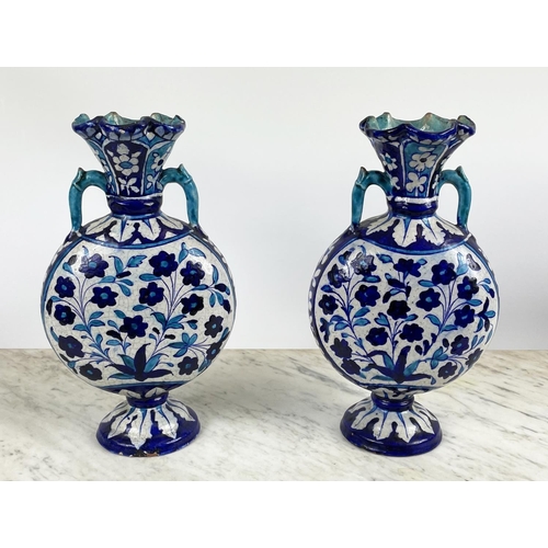 1 - SIND POTTERY MOONFLASK VASES,  a pair, 19th century decorated in blue and turquoise enamels with scr... 