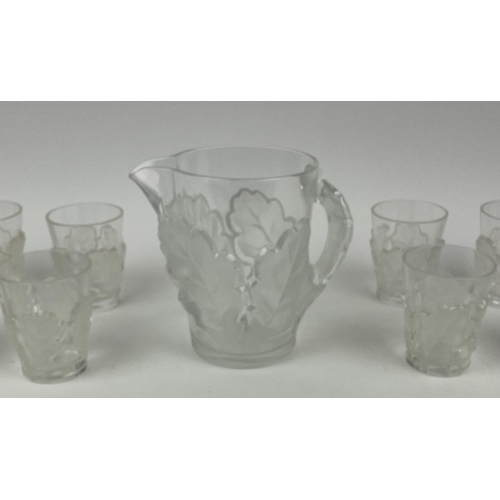 11 - LALIQUE WATER PITCHER, frosted chene oak leaf design with twelve glasses. (13)