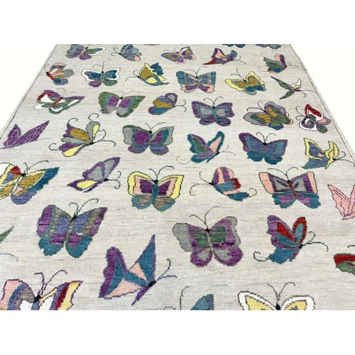 167 - FINE BUTTERFLY SUZANI DESIGN CARPET, 305cm x 205cm.