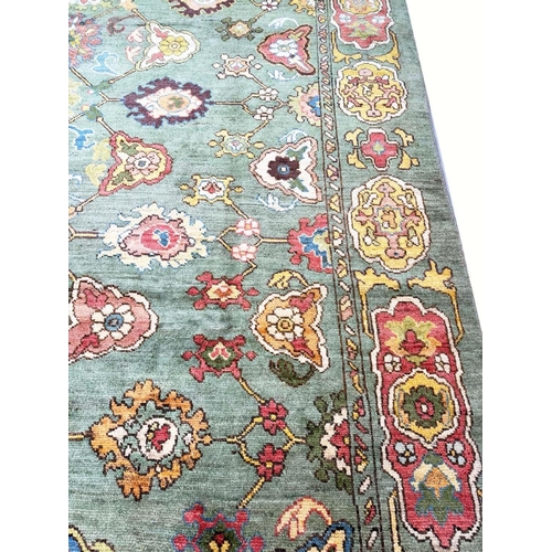 178 - FINE GREEN TURKISH OUSHAK CARPET, 390cm x 328cm.