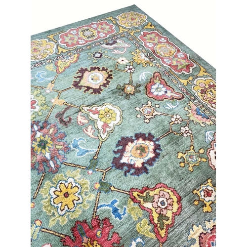 178 - FINE GREEN TURKISH OUSHAK CARPET, 390cm x 328cm.