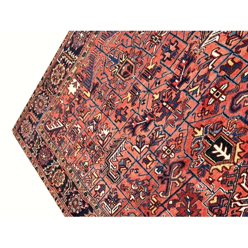 187 - ANTIQUE PERSIAN HERIZ CARPET, 355cm x 270cm.