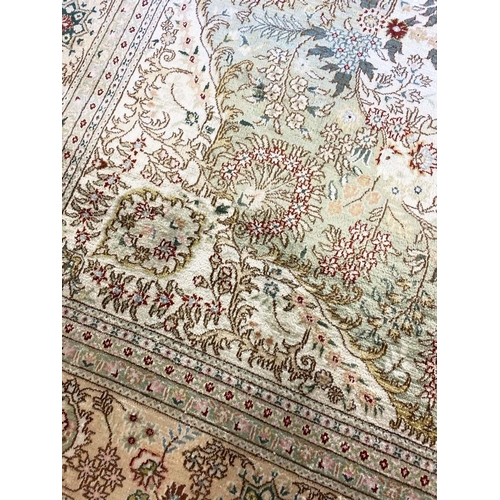 188 - FINE PURE SILK HEREKE DESIGN CARPET, 280cm x 180cm.