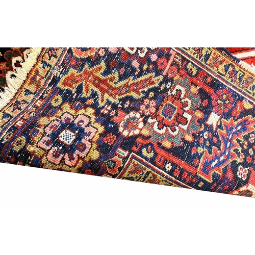 194 - ANTIQUE PERSIAN HERIZ CARPET, 375cm x 277cm.