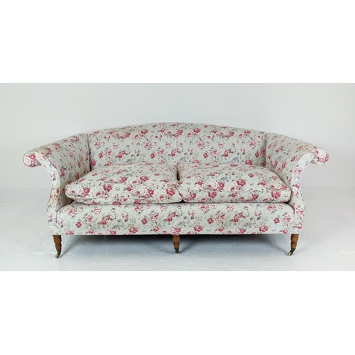 199 - SOFA, three seater, upholstered in Cath Kidson fabric with turned front supports and castors, 215cm ... 