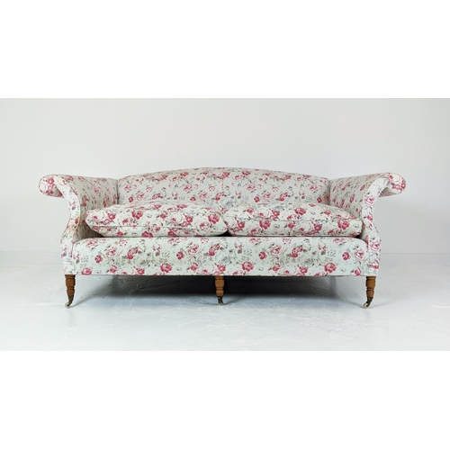 199 - SOFA, three seater, upholstered in Cath Kidson fabric with turned front supports and castors, 215cm ... 