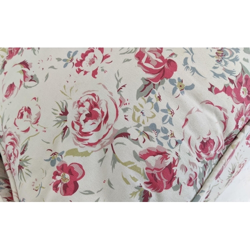 199 - SOFA, three seater, upholstered in Cath Kidson fabric with turned front supports and castors, 215cm ... 