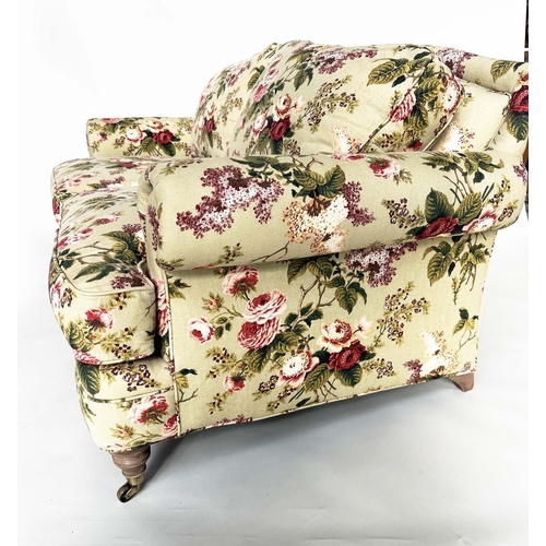 214 - SOFA BY HANCOCK AND MOORE, country house style rose print with arched back, scroll arms, turned supp... 