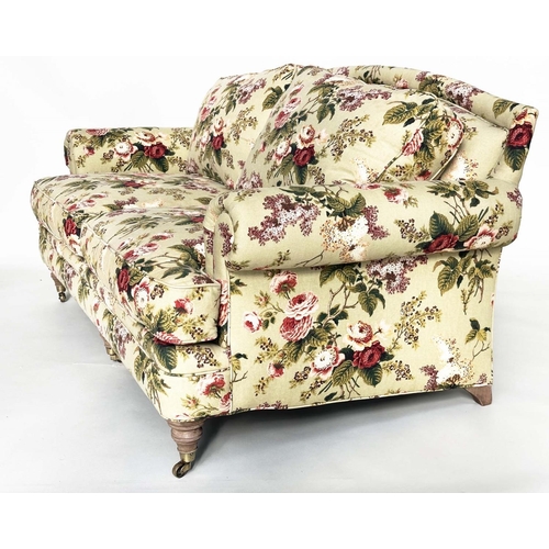 214 - SOFA BY HANCOCK AND MOORE, country house style rose print with arched back, scroll arms, turned supp... 