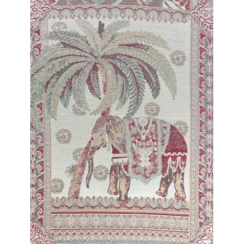 223 - SCREEN, three fold arched 'Raj' fabric, upholstered with elephants and palm trees and brass studded,... 