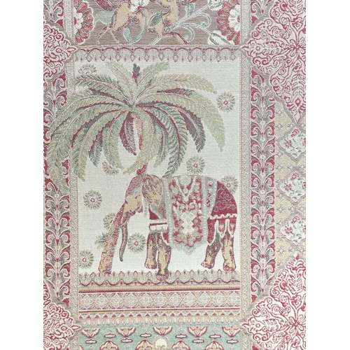 223 - SCREEN, three fold arched 'Raj' fabric, upholstered with elephants and palm trees and brass studded,... 