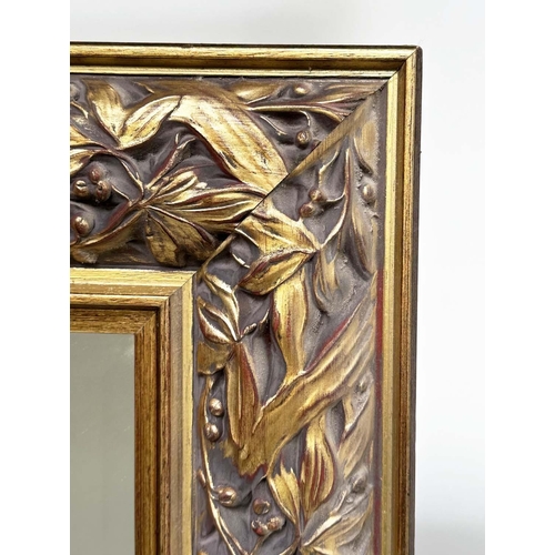 227 - WALL MIRROR, rectangular gilt composition with pierced foliate frame, 176cm H x 114cm.