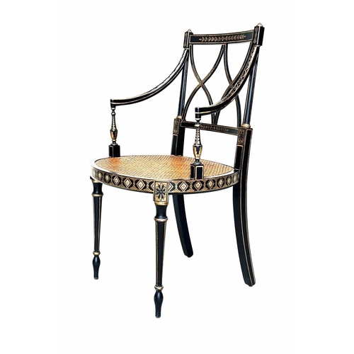 231 - ARMCHAIRS, a pair, Regency style black lacquered and gilt painted with lattice backs and cane seats,... 