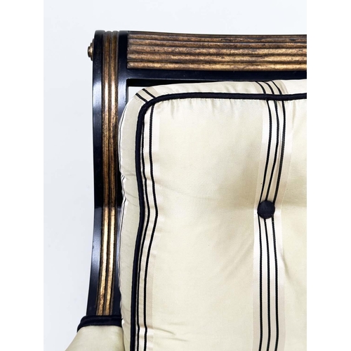 233 - LIBRARY BERGERE BY JULIAN CHICHESTER, Regency style ebonised, gilt heightened and caned, 58cm W.