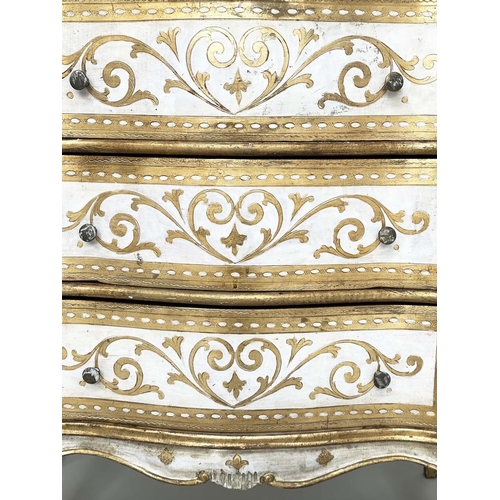 241 - FLORENTINE COMMODE, Italian white painted and parcel gilt of serpentine form with three drawers, 79c... 