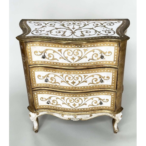 241 - FLORENTINE COMMODE, Italian white painted and parcel gilt of serpentine form with three drawers, 79c... 