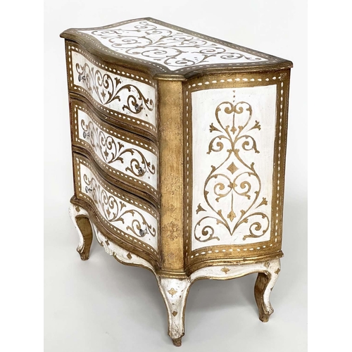 241 - FLORENTINE COMMODE, Italian white painted and parcel gilt of serpentine form with three drawers, 79c... 