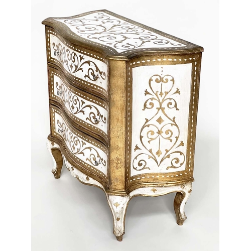 241 - FLORENTINE COMMODE, Italian white painted and parcel gilt of serpentine form with three drawers, 79c... 