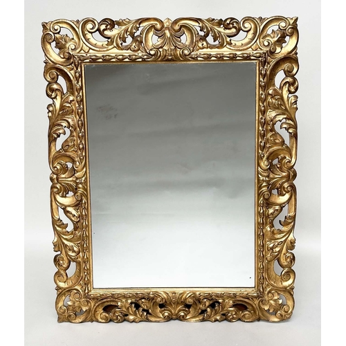 242 - FLORENTINE WALL MIRROR, 19th century Italian rectangular carved giltwood C scroll and foliate pierce... 