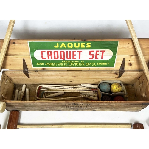 26 - JAQUES CROQUET SET, early/mid 20th century comprising four clubs, balls, hoops, end post etc, in a p... 