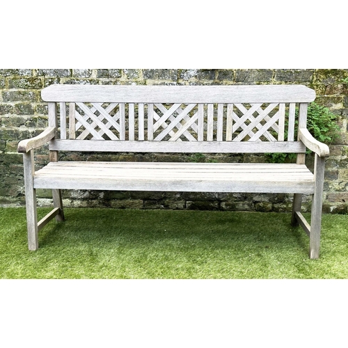 271 - GARDEN BENCH, well weathered silvery teak of slatted construction with lattice panelled back, 160cm ... 