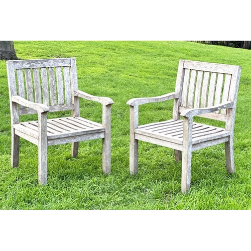 273 - GARDEN ARMCHAIRS, a pair, well weathered teak of slatted construction, 58cm W. (2)