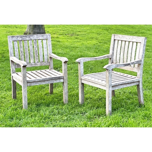 273 - GARDEN ARMCHAIRS, a pair, well weathered teak of slatted construction, 58cm W. (2)