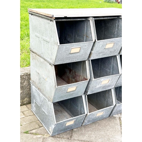 279 - STACKING TRAYS, a set of nine, galvanised with softwood work top, 90cm x 50cm x 91cm H.