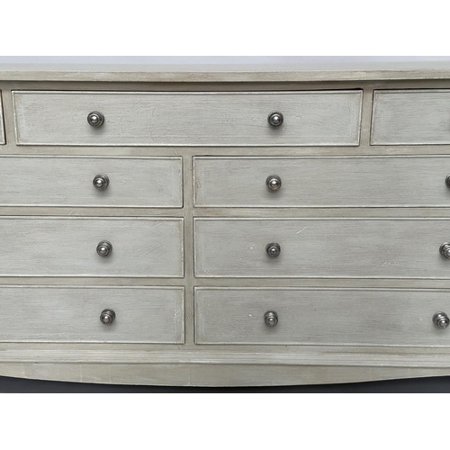 297 - LOW CHEST, Georgian style traditionally grey painted with nine drawers, canted angles and bracket su... 