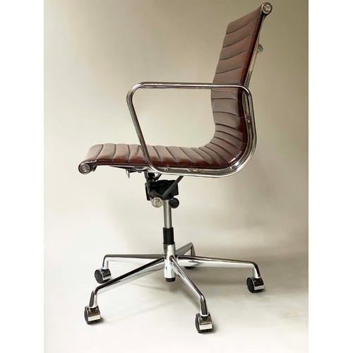 306 - AFTER CHARLES AND RAY EAMES ALUMINIUM GROUP STYLE DESK CHAIR, with ribbed natural mid brown leather ... 