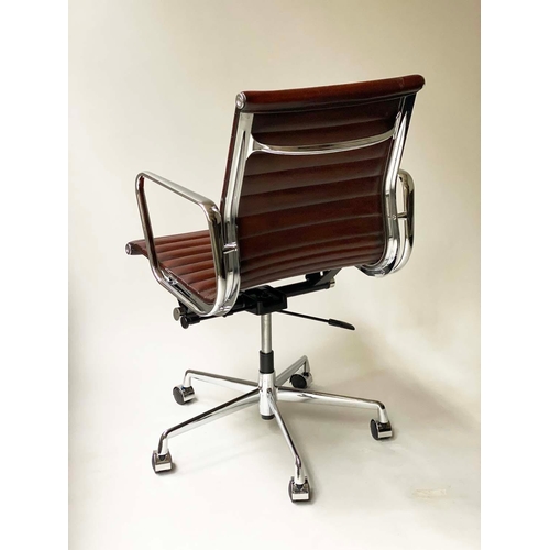 306 - AFTER CHARLES AND RAY EAMES ALUMINIUM GROUP STYLE DESK CHAIR, with ribbed natural mid brown leather ... 