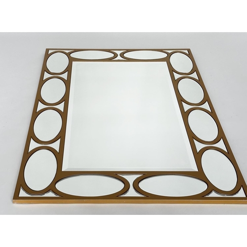 307 - WALL MIRROR, rectangular gilt with oval panelled marginal plates and bevelled mirror throughout, 80c... 