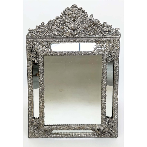 316 - DUTCH WALL MIRROR, 19th century Dutch repoussé silvered metal cushion frame, marginal plates and cre... 