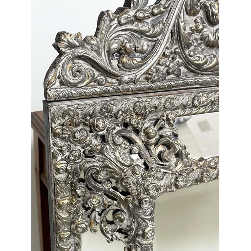 316 - DUTCH WALL MIRROR, 19th century Dutch repoussé silvered metal cushion frame, marginal plates and cre... 