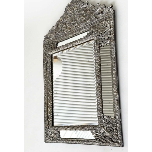 316 - DUTCH WALL MIRROR, 19th century Dutch repoussé silvered metal cushion frame, marginal plates and cre... 